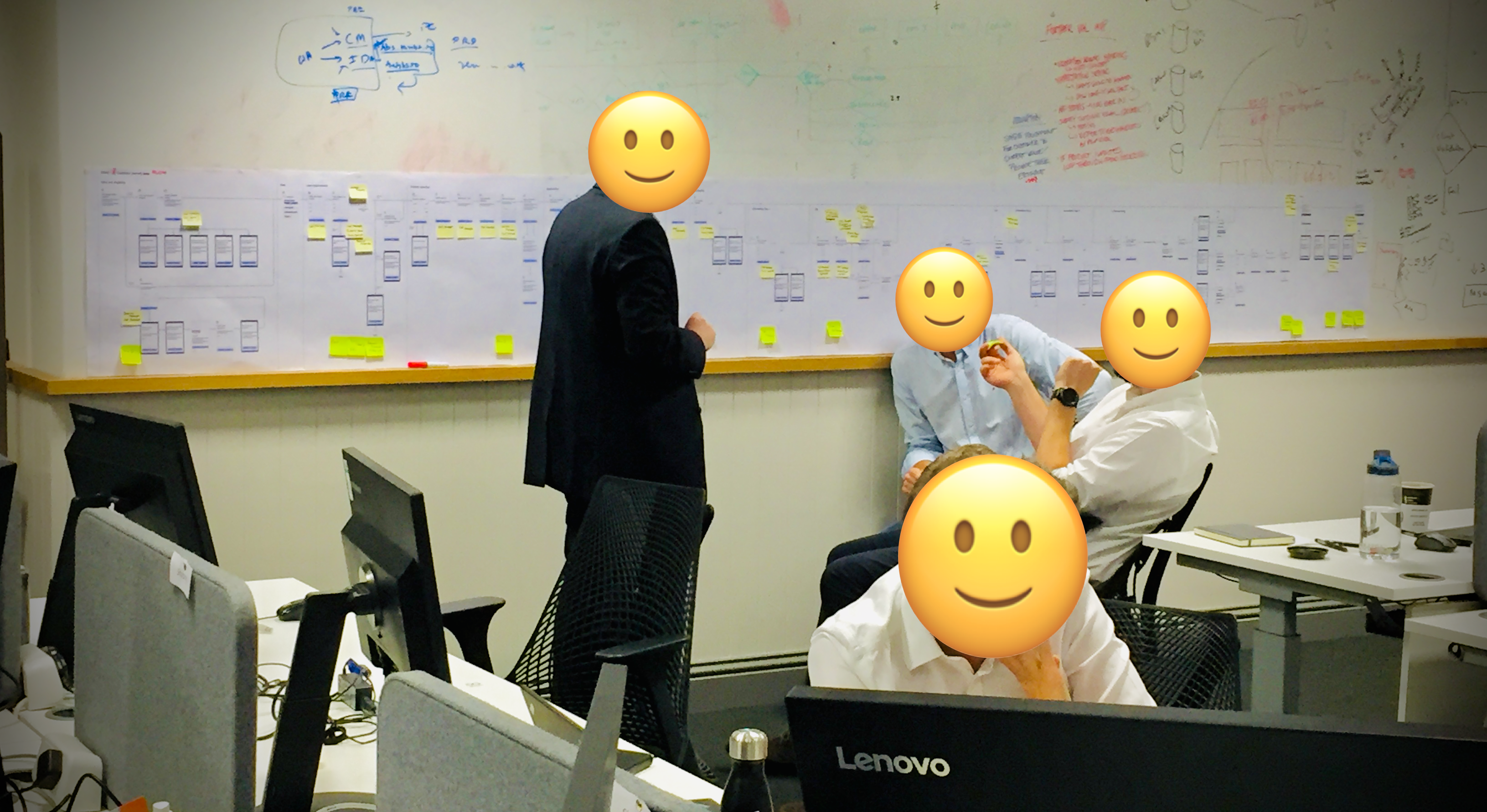 Team workshop around a wall-length remortgage journey map with sticky notes.